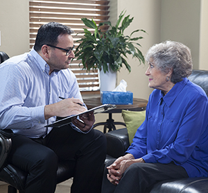 Woman talking to therapist.